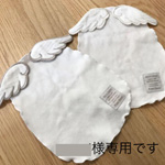 天使の羽根が付いた背中の汗取りパットの写真